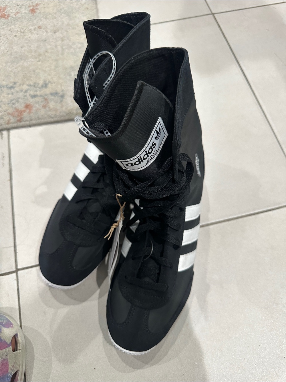 adidas Black and White High-Top Sneakers